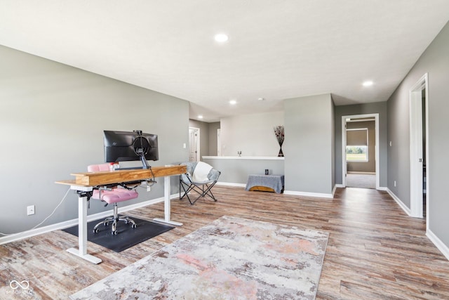 office area with wood finished floors, baseboards, and recessed lighting