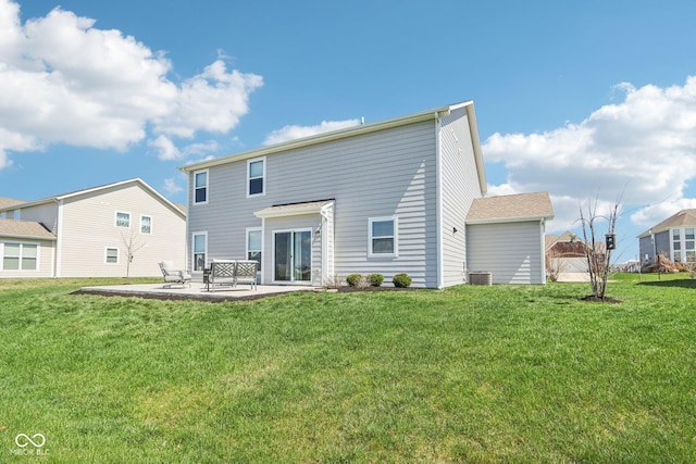 back of property featuring a patio area, central air condition unit, and a lawn