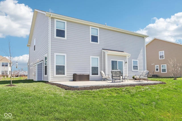 back of house with a yard, cooling unit, and a patio
