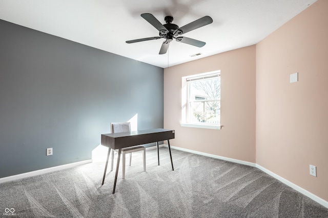 office with carpet flooring, a ceiling fan, baseboards, and visible vents