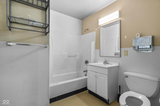 bathroom with bathtub / shower combination, toilet, and vanity