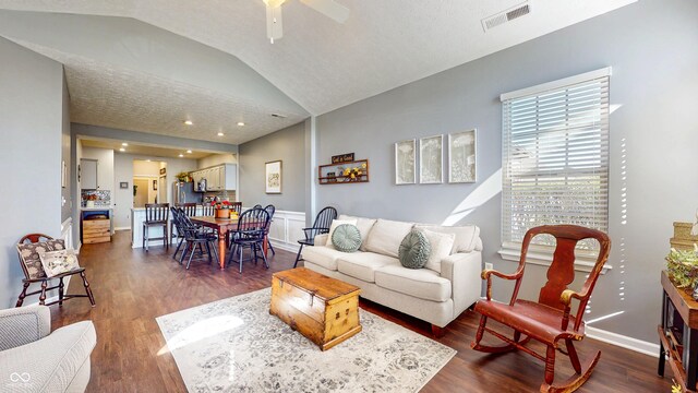 7971 Cool Hollow Pl, Indianapolis, IN 46237 - living area with dark wood finished floors, a ceiling fan, visible vents, lofted ceiling, and baseboards