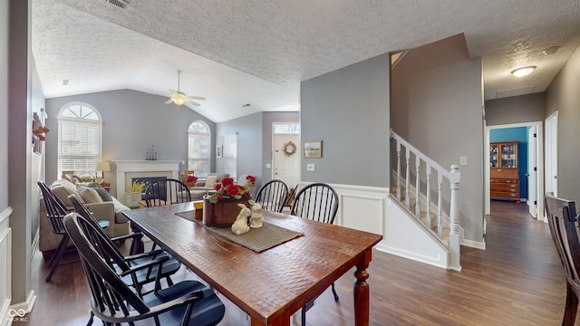 7971 Cool Hollow Pl, Indianapolis, IN 46237 - dining room featuring a textured ceiling, stairs, wood finished floors, lofted ceiling, and ceiling fan