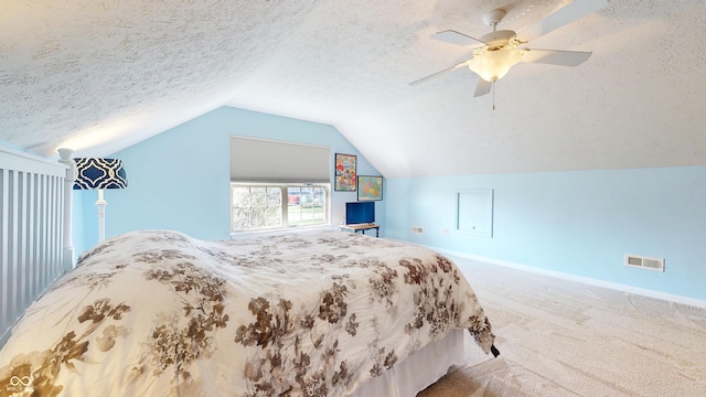 7971 Cool Hollow Pl, Indianapolis, IN 46237 - carpeted bedroom featuring a textured ceiling, ceiling fan, baseboards, lofted ceiling, and visible vents