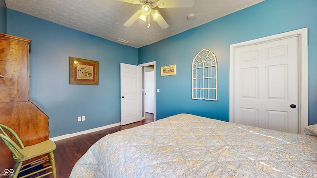 7971 Cool Hollow Pl, Indianapolis, IN 46237 - bedroom with visible vents, baseboards, a ceiling fan, and wood finished floors