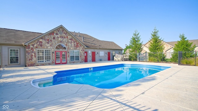 7971 Cool Hollow Pl, Indianapolis, IN 46237 - view of pool featuring fence, a patio area, a fenced in pool, and french doors