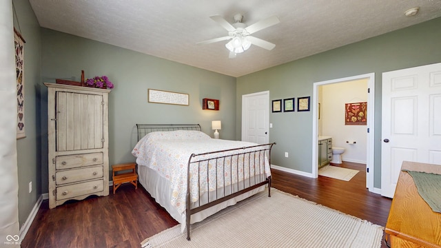 7971 Cool Hollow Pl, Indianapolis, IN 46237 - bedroom with ceiling fan, baseboards, dark wood-style flooring, and ensuite bathroom