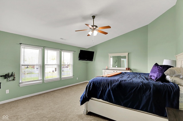 bedroom featuring vaulted ceiling, visible vents, baseboards, carpet flooring, and ceiling fan