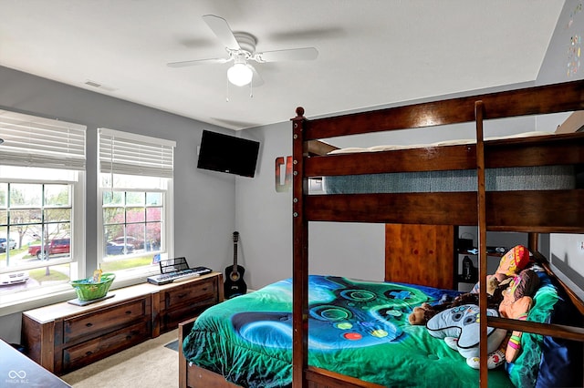 bedroom with visible vents and ceiling fan