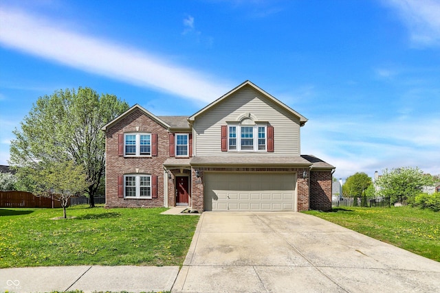 traditional-style house featuring driveway, fence, a front yard, and a garage