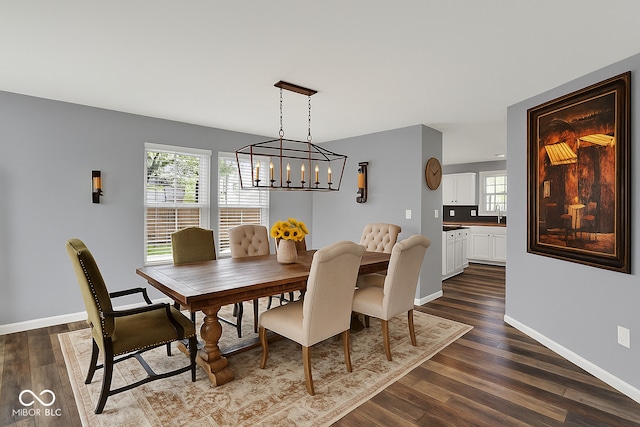 8531 Aberdeenshire Ct, Indianapolis, IN 46259 - dining room with dark wood-style flooring, plenty of natural light, and a chandelier