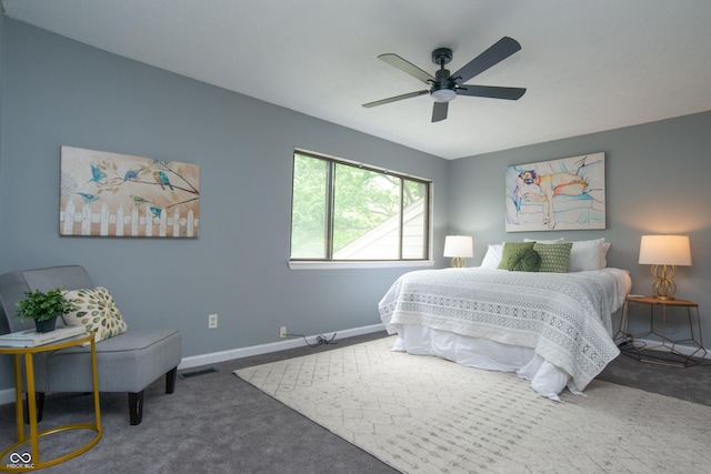 bedroom featuring carpet floors, baseboards, a ceiling fan, and visible vents