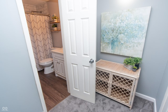 interior space with toilet and curtained shower
