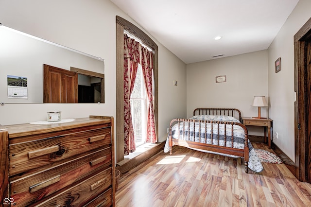 3864 N US Highway 231, Greencastle, IN 46135 - bedroom with recessed lighting, visible vents, and light wood-type flooring