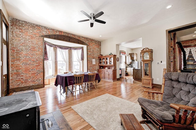 3864 N US Highway 231, Greencastle, IN 46135 - living room with a wealth of natural light, brick wall, light wood-style floors, and ceiling fan