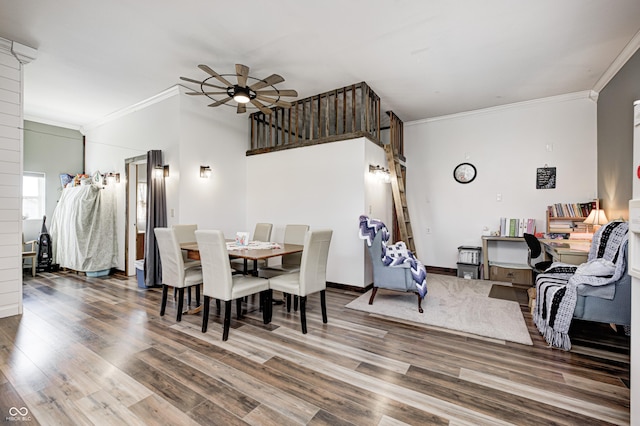 3864 N US Highway 231, Greencastle, IN 46135 - dining room with crown molding, wood finished floors, ceiling fan, and baseboards