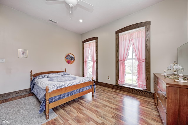 3864 N US Highway 231, Greencastle, IN 46135 - bedroom with visible vents, ceiling fan, baseboards, and light wood-style flooring