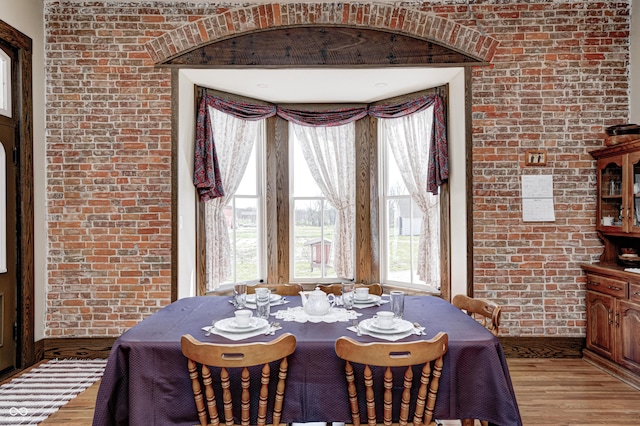 3864 N US Highway 231, Greencastle, IN 46135 - dining area with light wood finished floors and brick wall