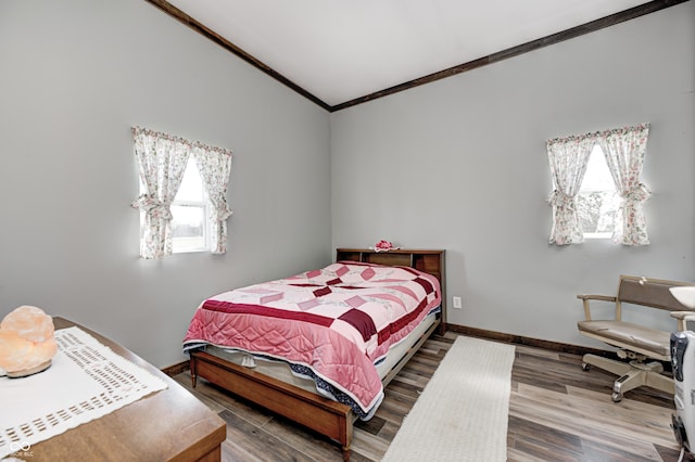 3864 N US Highway 231, Greencastle, IN 46135 - bedroom with crown molding, wood finished floors, and baseboards