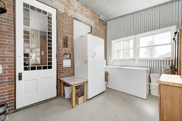 3864 N US Highway 231, Greencastle, IN 46135 - laundry area with brick wall and metal wall