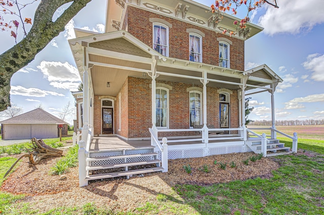 3864 N US Highway 231, Greencastle, IN 46135 - italianate home with a porch and brick siding