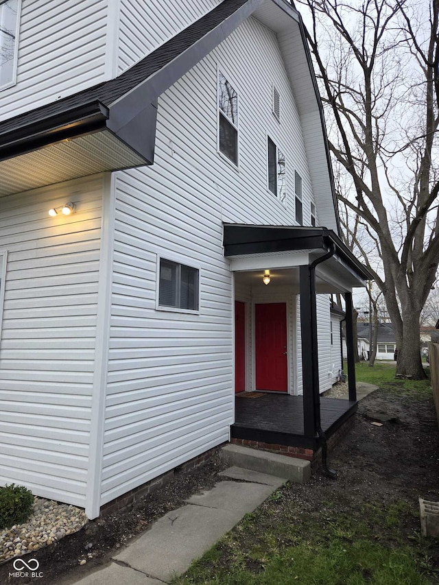 view of side of property featuring crawl space