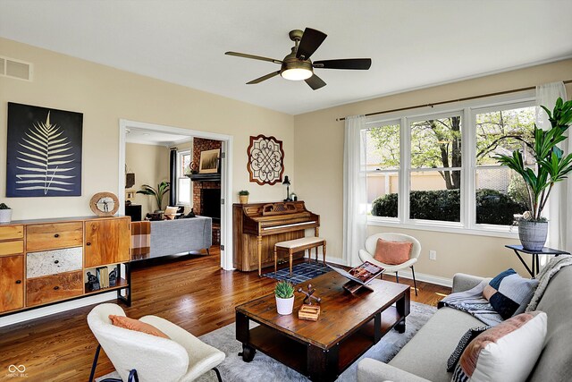 4932 Willow Ridge Ct, Zionsville, IN 46077 - living area featuring visible vents, dark wood-type flooring, baseboards, and ceiling fan