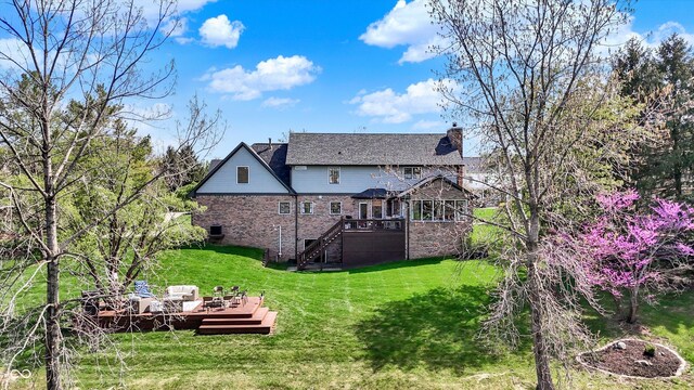 4932 Willow Ridge Ct, Zionsville, IN 46077 - back of house with stairway, a wooden deck, a yard, and a chimney