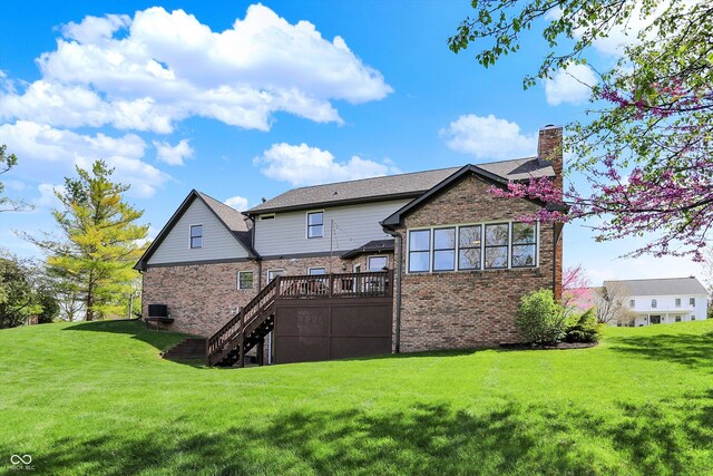 4932 Willow Ridge Ct, Zionsville, IN 46077 - rear view of property featuring stairs, a wooden deck, a yard, and brick siding