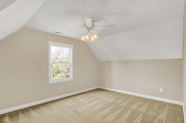 4932 Willow Ridge Ct, Zionsville, IN 46077 - additional living space with baseboards, a ceiling fan, lofted ceiling, and light colored carpet