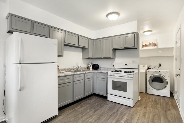 3809 Wildwood Dr, Indianapolis, IN 46239 - kitchen with white appliances, gray cabinets, and a sink
