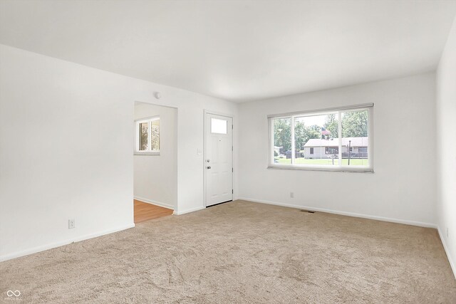 3809 Wildwood Dr, Indianapolis, IN 46239 - unfurnished room with carpet floors and baseboards