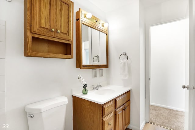 3809 Wildwood Dr, Indianapolis, IN 46239 - bathroom featuring toilet and vanity