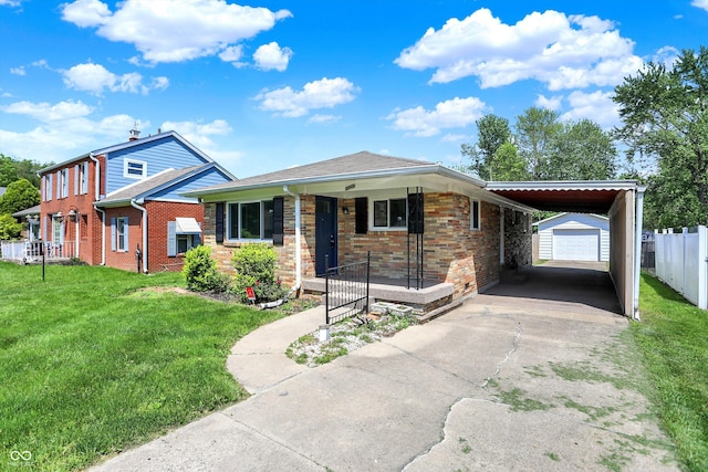 3809 Wildwood Dr, Indianapolis, IN 46239 - view of front facade featuring an outdoor structure, driveway, brick siding, a carport, and a porch