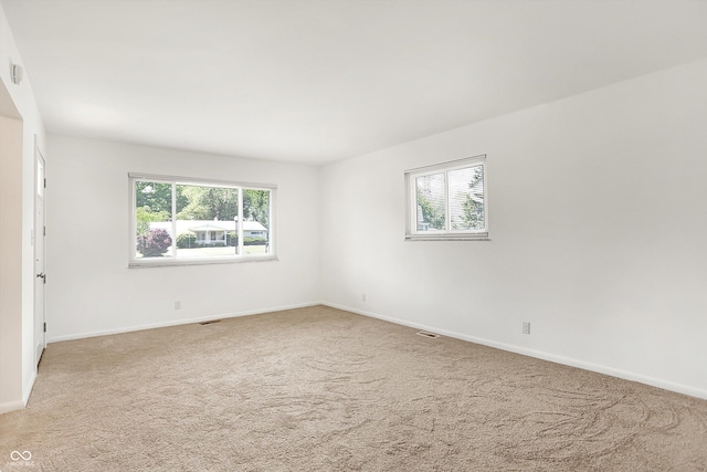 3809 Wildwood Dr, Indianapolis, IN 46239 - carpeted spare room with baseboards