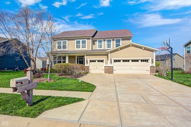 4644 Shelby Cir, Greenwood, IN 46143 - view of front of home with a garage, a front yard, brick siding, and driveway