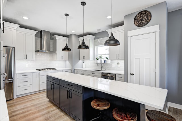 4644 Shelby Cir, Greenwood, IN 46143 - kitchen with a breakfast bar, backsplash, wall chimney exhaust hood, stainless steel appliances, and a sink