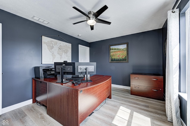 4644 Shelby Cir, Greenwood, IN 46143 - office space with wood finished floors, baseboards, a ceiling fan, and visible vents