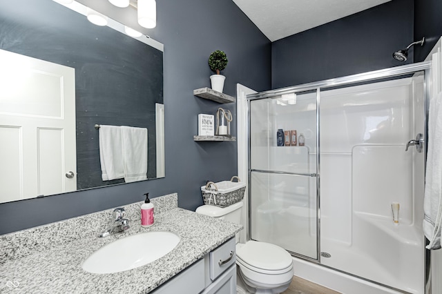 4644 Shelby Cir, Greenwood, IN 46143 - full bathroom with toilet, a stall shower, and vanity