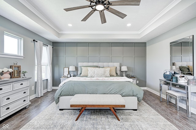 4644 Shelby Cir, Greenwood, IN 46143 - bedroom featuring a raised ceiling, crown molding, and wood finished floors