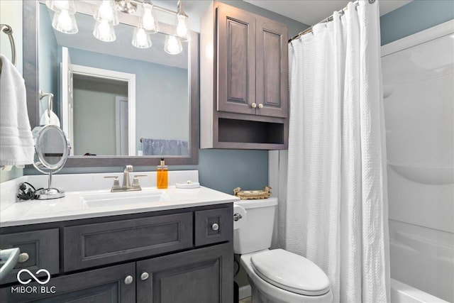 full bathroom with vanity and toilet