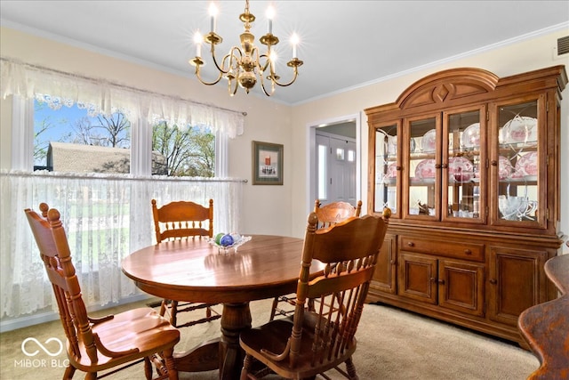 dining space featuring light carpet, visible vents, an inviting chandelier, and crown molding