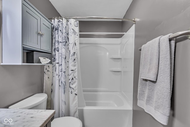 bathroom featuring shower / tub combo with curtain, vanity, and toilet