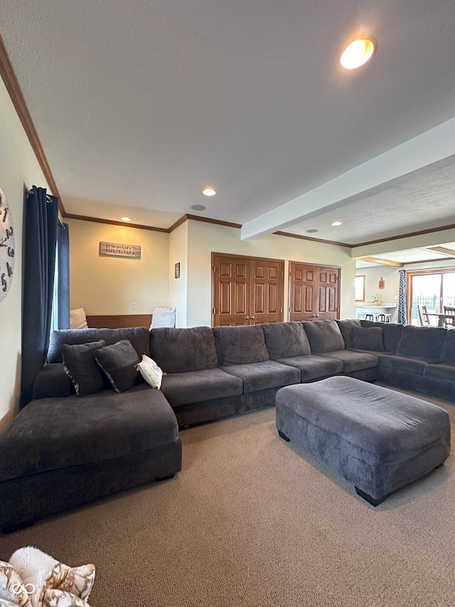 carpeted living room featuring crown molding and recessed lighting