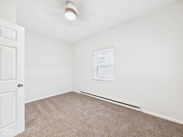 709 S A St, Elwood, IN 46036 - carpeted spare room featuring a baseboard radiator, baseboards, and a ceiling fan