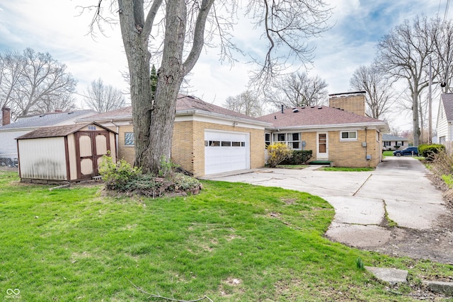 view of front of house featuring an outdoor structure, a chimney, driveway, brick siding, and a garage