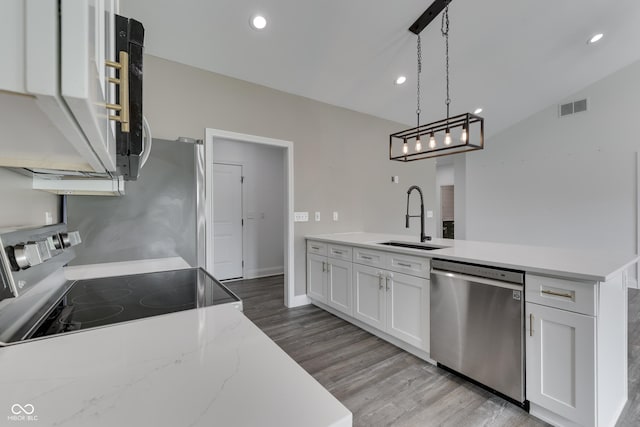 2144 Connie Ct, Franklin, IN 46131 - kitchen with dishwasher, a sink, electric stove, light wood-style floors, and recessed lighting