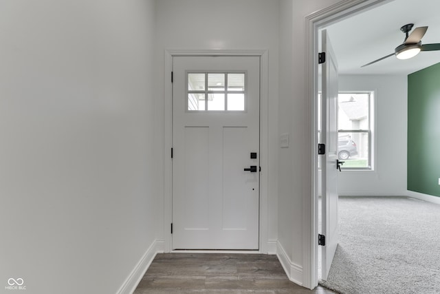 2144 Connie Ct, Franklin, IN 46131 - entrance foyer with healthy amount of natural light, baseboards, a ceiling fan, and wood finished floors