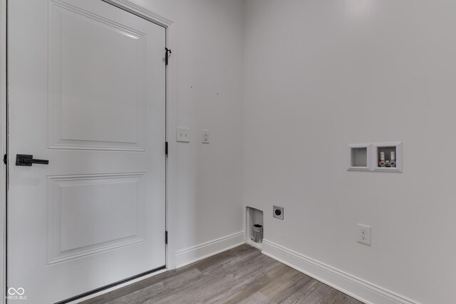 2144 Connie Ct, Franklin, IN 46131 - laundry room featuring electric dryer hookup, wood finished floors, hookup for a washing machine, and baseboards