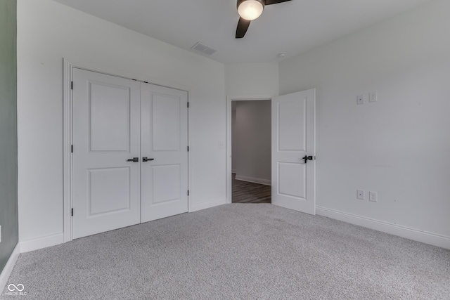 2144 Connie Ct, Franklin, IN 46131 - unfurnished bedroom with carpet flooring, baseboards, a closet, and a ceiling fan
